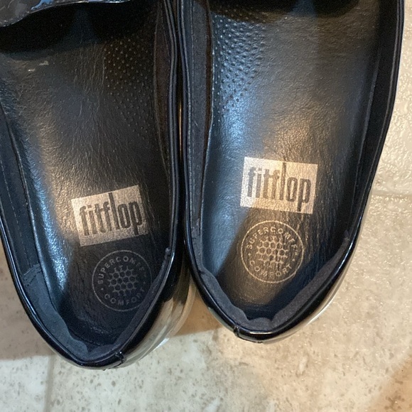 Fit flip black shiny frilly loafers style black shed with small mark on one toe. - Picture 7 of 10